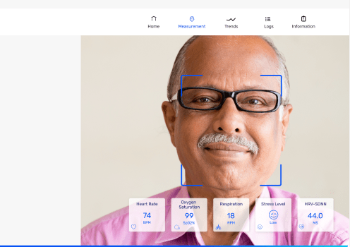 A smiling elderly man with glasses, featuring an RPM Logix overlay of health metrics such as heart rate and oxygen saturation on the screen.
